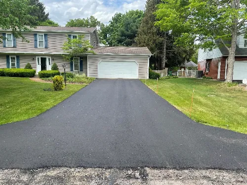 Residential driveway after asphalt paving service