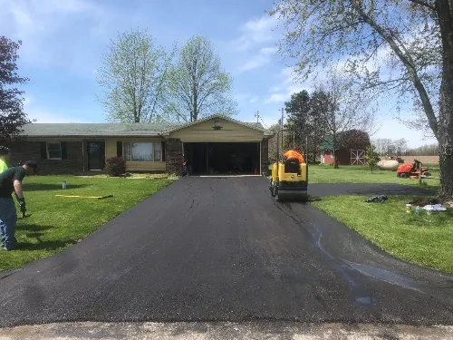 Residential driveway after asphalt paving service