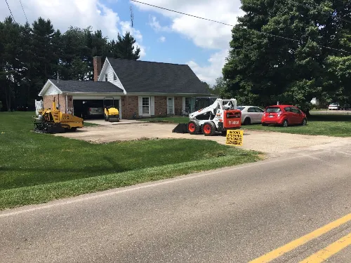 Residential driveway before asphalt paving service