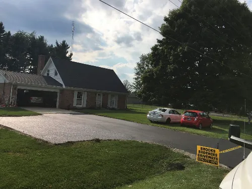 Residential driveway after asphalt paving service