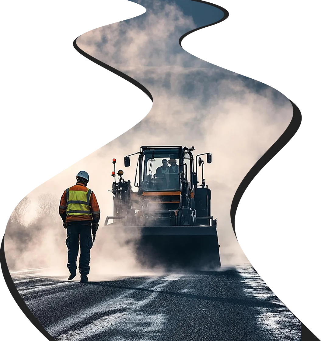 Asphalt contractors working on a driveway